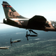 A US Air Force A-7D Corsair II from the 76th Tactical Fighter Squadron drops Mark 82 hi-drag bombs over a bombing range in Florida. (US Air Force)